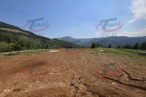 Toros Emlak'tan Aladağ’da 4977 m² Duvarı Örülmüş Tarla - fotoğraf 5