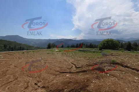 Toros Emlak'tan Aladağ’da 4977 m² Duvarı Örülmüş Tarla - fotoğraf 13