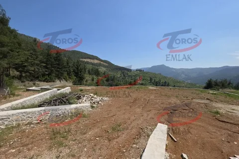 Toros Emlak'tan Aladağ’da 4977 m² Duvarı Örülmüş Tarla - fotoğraf 16