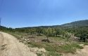 TOROS EMLAK’TAN KUZUCU MAHALLESİNDE 4790 M² SATILIK TARLA